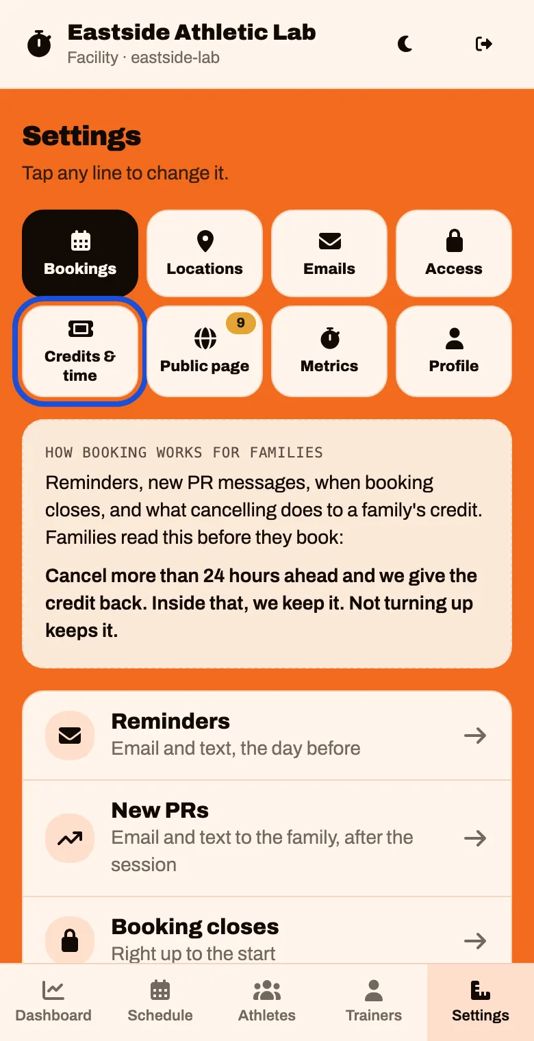The Settings screen, with eight tiles. Credits and time is in the second row